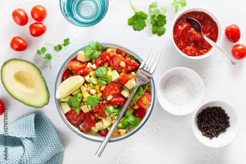 healthy vegan avocado sweetcorn tomato salad