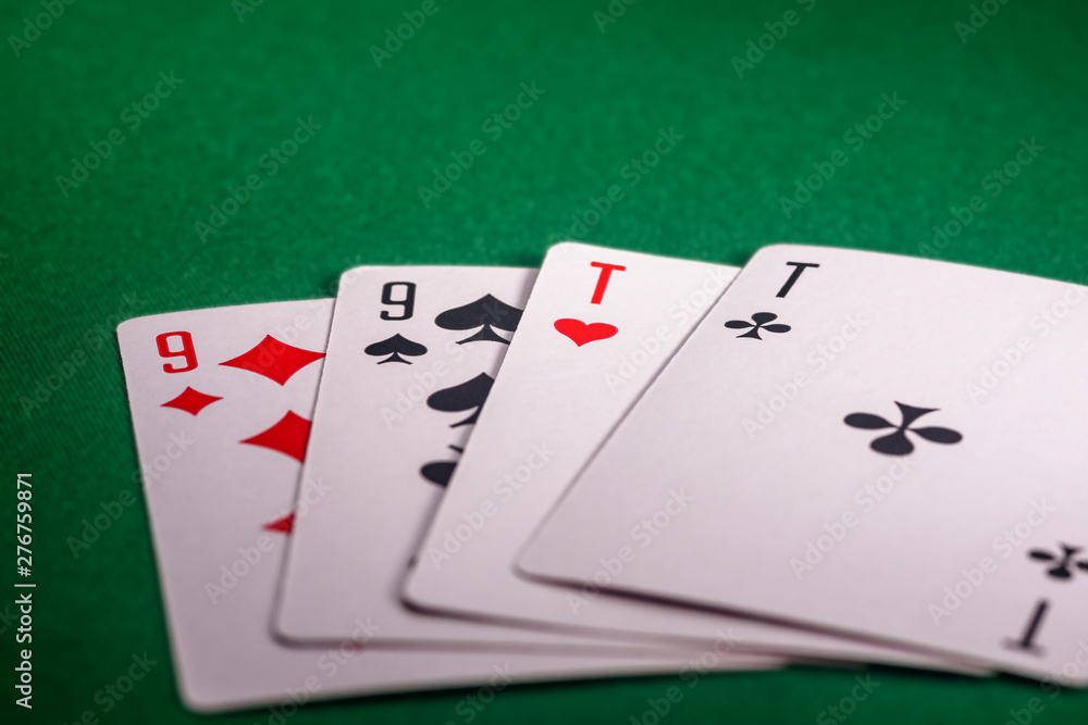 playing cards on the green table. Combination playing cards on the green table. Combination