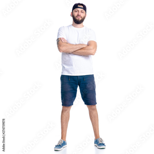 Man in shorts and cap standing happiness smiling on white background isolation photo