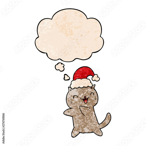 cute cartoon christmas cat and thought bubble in grunge texture pattern style © lineartestpilot