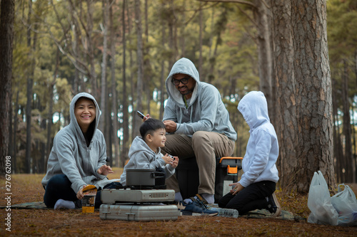 Young family with children having fun in nature