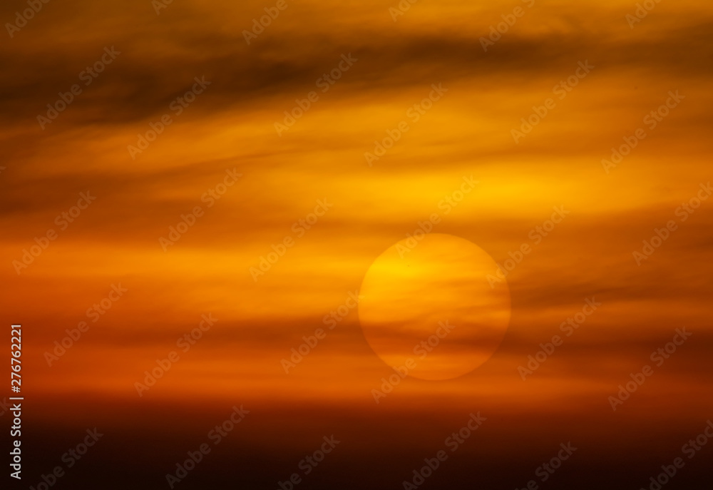 Isolated Big Sun under the Clouds in Sunset, evening.
