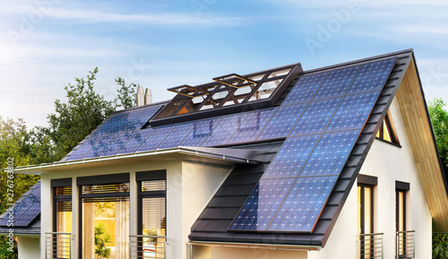 Foto Solar panels on the gable roof of a modern house
