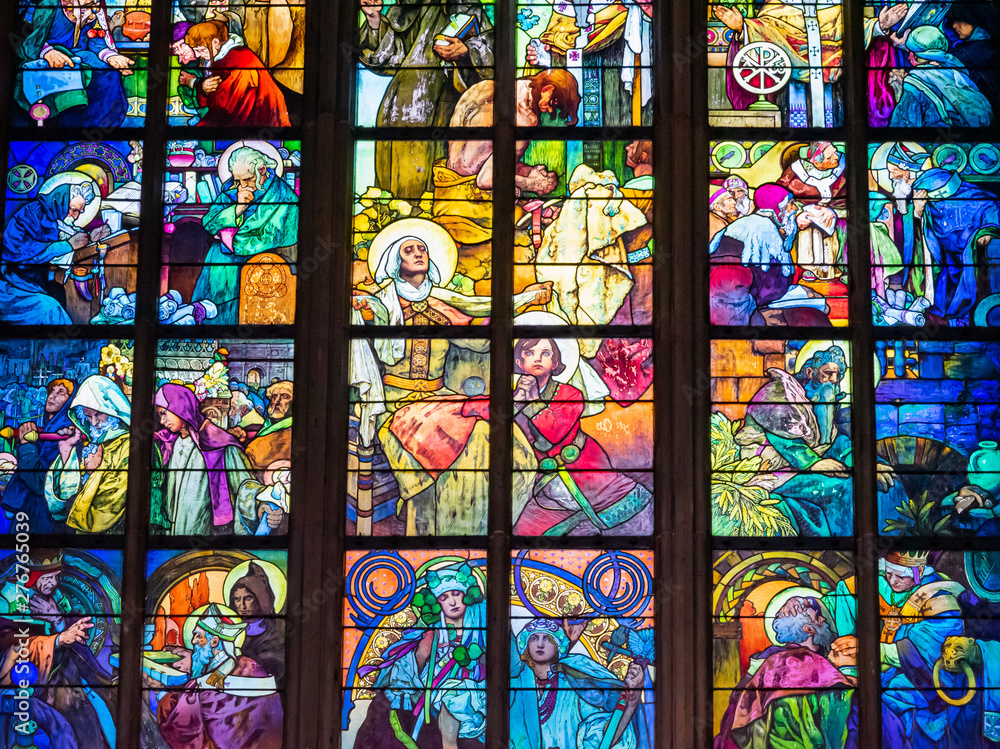 Colorful illustration on religious stained glass window