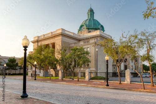 Historic Volusia County Courthouse with copper dome clock street view in DeLand, Florida photo