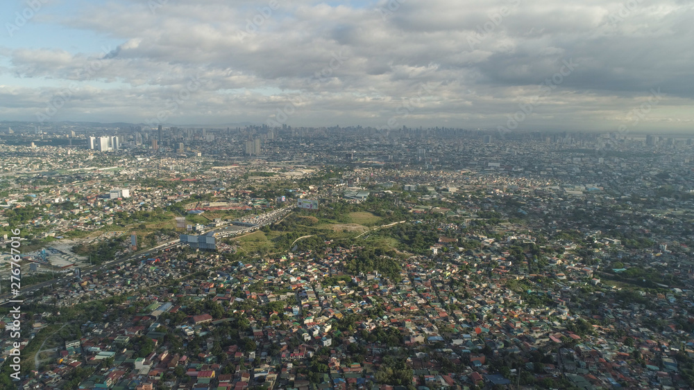 Aerial view of Manila city with skyscrapers and buildings. Philippines, Luzon. Aerial skyline of Manila.