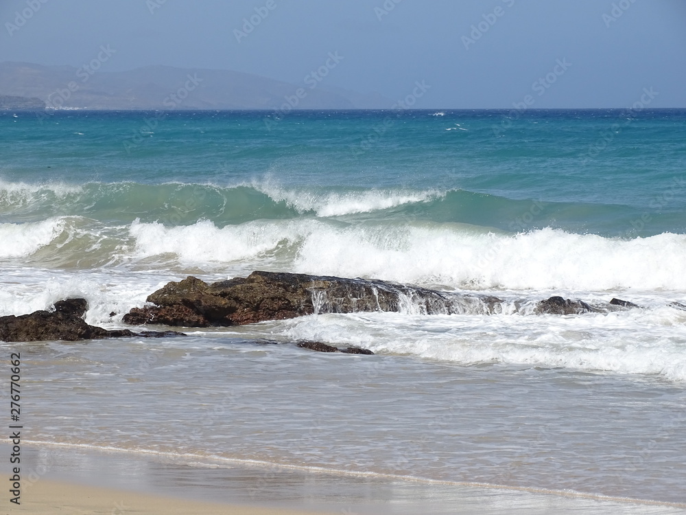 waves crashing on the beach