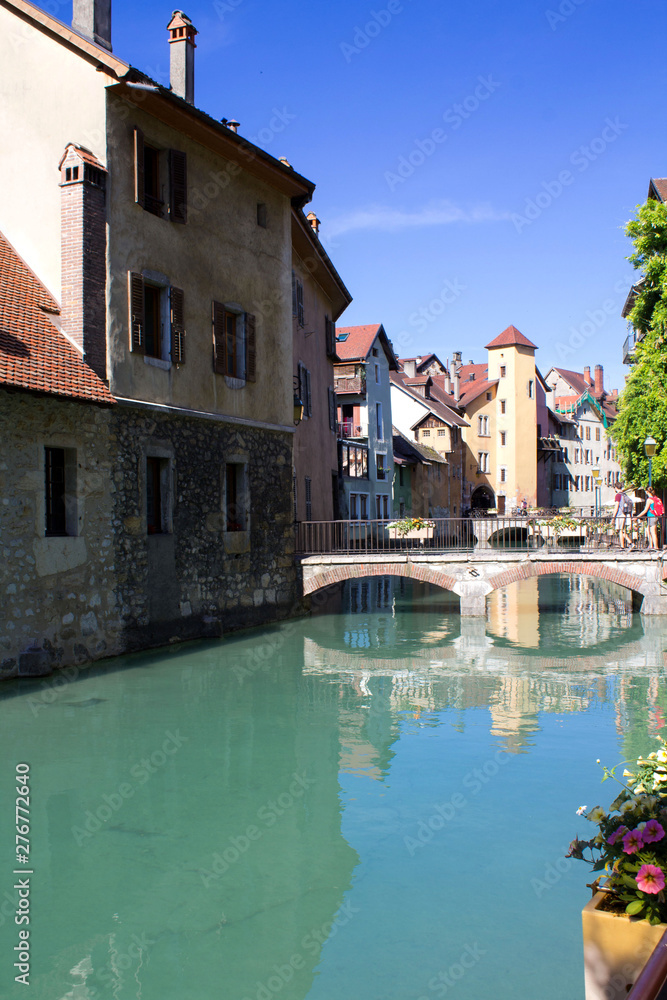 Beautiful view of houses and river on a sunny day.Annecy.France.