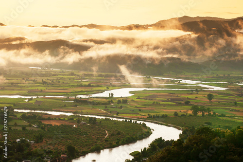 Scenery valley with Kok River in the morning mist.