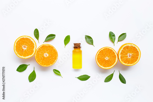 Orange fruits with citrus oil. Natural vitamin C on white background.