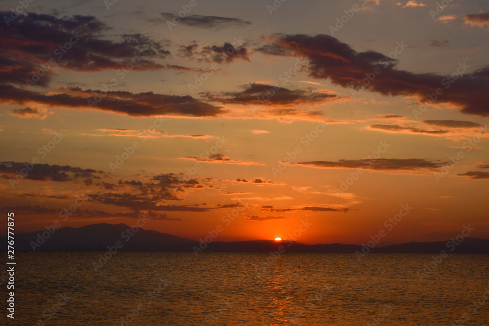 Tropical sunset on the beach Tropical sunset on the beach
