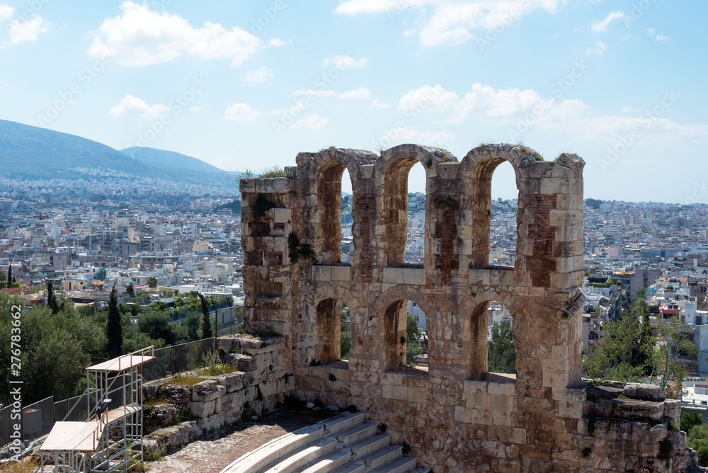 Ancient stone theater with marble steps of Odeon of Herodes Atticus on the southern slope of the Acropolis. Athens, Greece. The Odeon is the main scene of the Athenian festival.