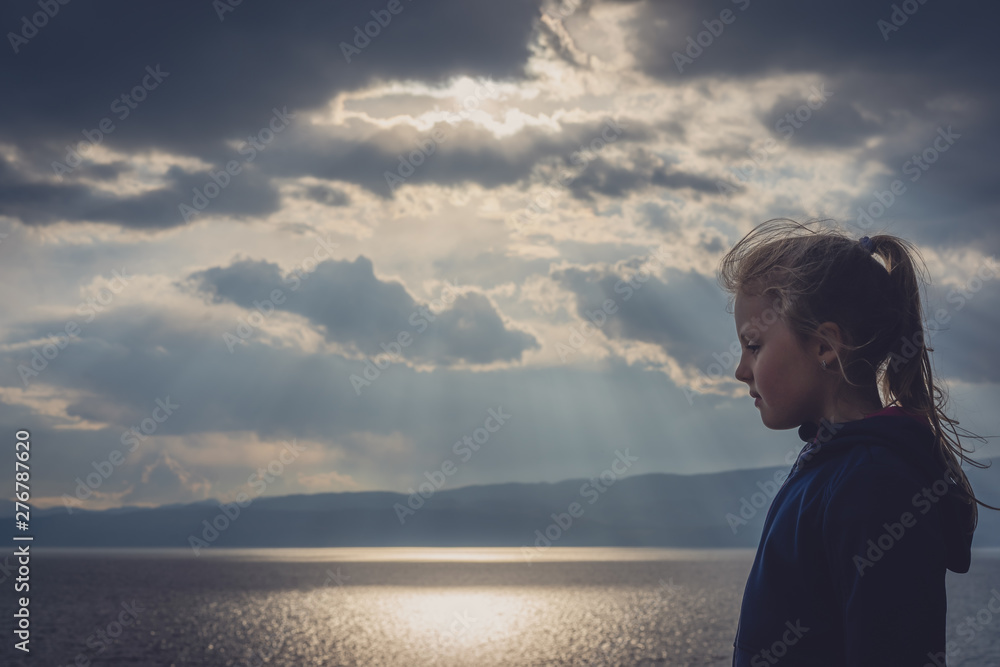 Little young girl by the lake portrait Little young girl by the lake portrait