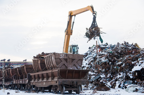 Crane-loading scrap in a train