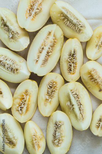 A group of brightly lit melon slices.