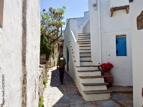 Walking  Near a Whitewashed House and Stairway in Tinos, Greece