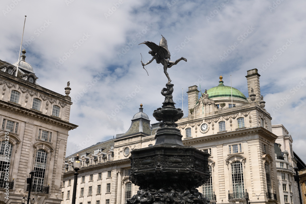 Shaftesbury Memorial Fountain toped by statue of winged Anteros in Piccadilly Circus with The Quadrant on Regent street London England