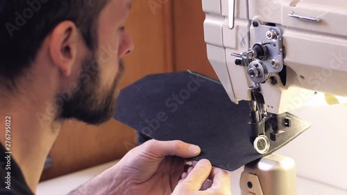 portrait of shoemaker or tailor work processes in the studio