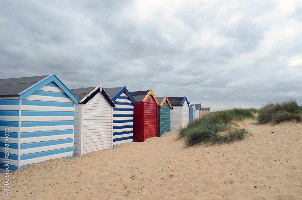 row of beach huts at southwold