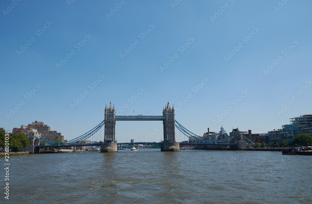 Obraz premium Tower Bridge above River Thames on sunny day. Historical and iconic landmark of London city