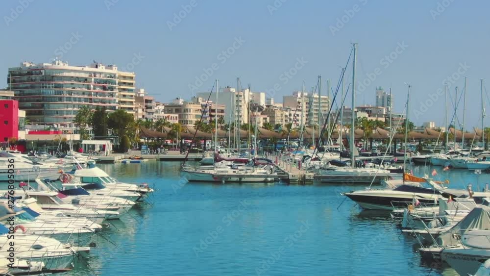 Motorboats and sailboats anchored at Santa Pola harbor, aerial view Motorboats and sailboats anchored at Santa Pola harbor, aerial view