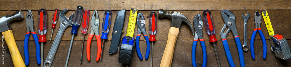 Working tools on wooden background Working tools on wooden background