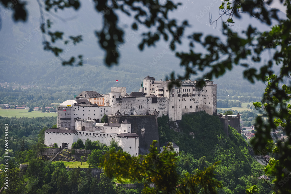 Obraz premium Views of the Austrian ancient city of Salzburg. Mozart's hometown. roofs, parks and architecture in summer