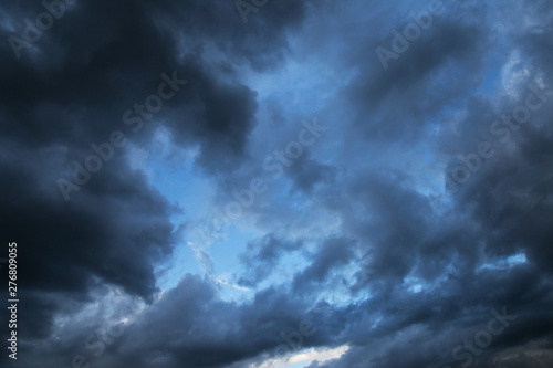 Epic Storm blue sky, dark clouds background texture