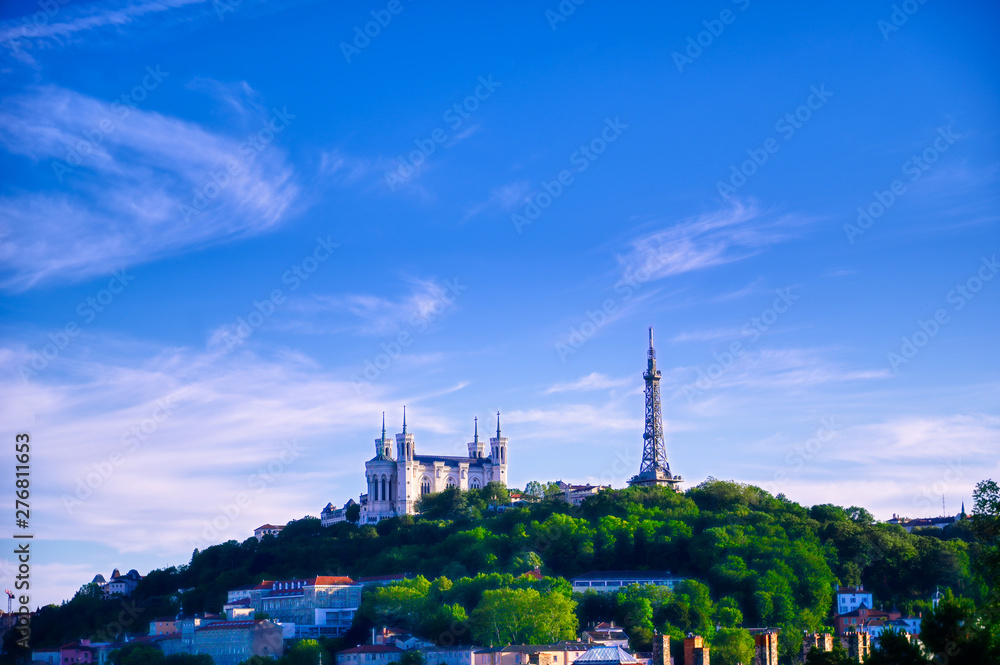 Obraz premium Lyon, France and the Basilica of Notre-Dame de Fourviere from Jardin des plantes.