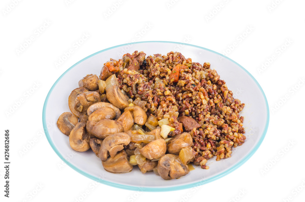 Vegetarian menu, red rice with champignons. Vegetarian menu, red rice with champignons.