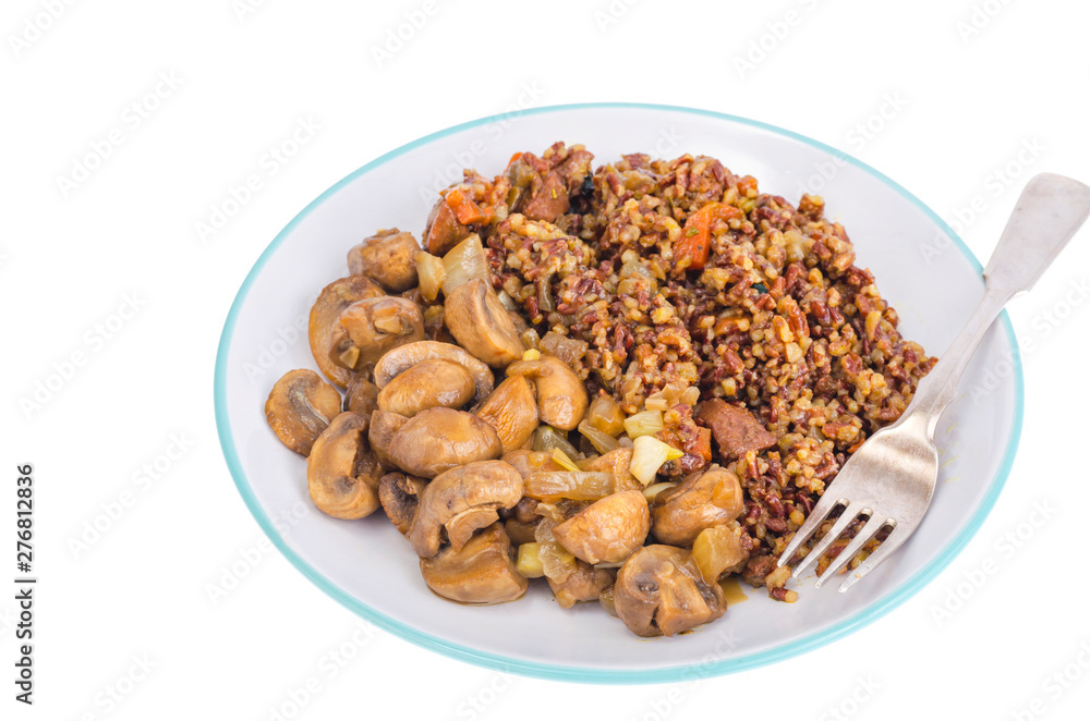 Vegetarian menu, red rice with champignons. Vegetarian menu, red rice with champignons.