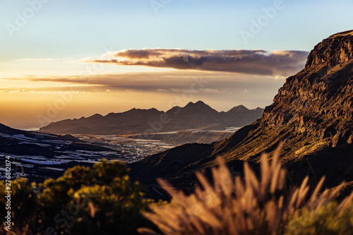 Nature and landscape of the Gran Canaria. Rocky mountains range, valleys, ocean.