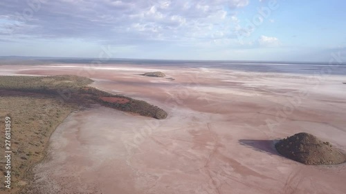 Aerial view of the lake ballard. The lonely hill in front of the lake rises from the flat sand landscape on which the Menzies Gormley statue stand photo