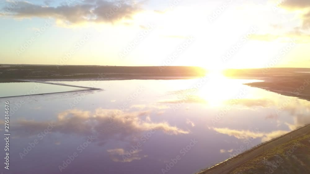 Aerial view of the Pink Lake in south west Australia. The pink lake reflects the red Australian desert sun in its clear water Aerial view of the Pink Lake in south west Australia. The pink lake reflects the red Australian desert sun in its clear water