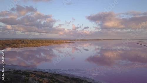 Aerial view of the Pink Lake in south west Australia. The pink lake reflects the red Australian desert sun in its clear water