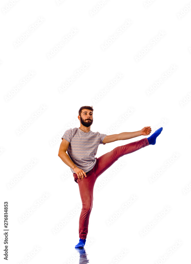 Full length of stylish young man dancing isolated on white Full length of stylish young man dancing isolated on white