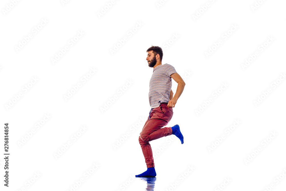 Cute guy doing breakdance isolated on white