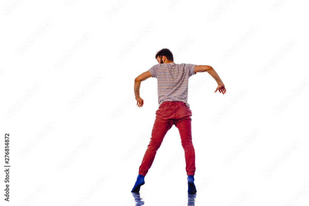 Teenager dancing break dance in action isolated on white