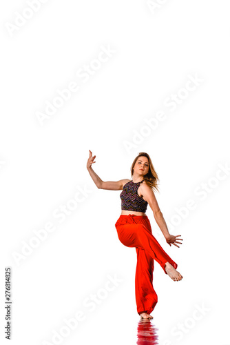 Style dancer posing on a studio white background