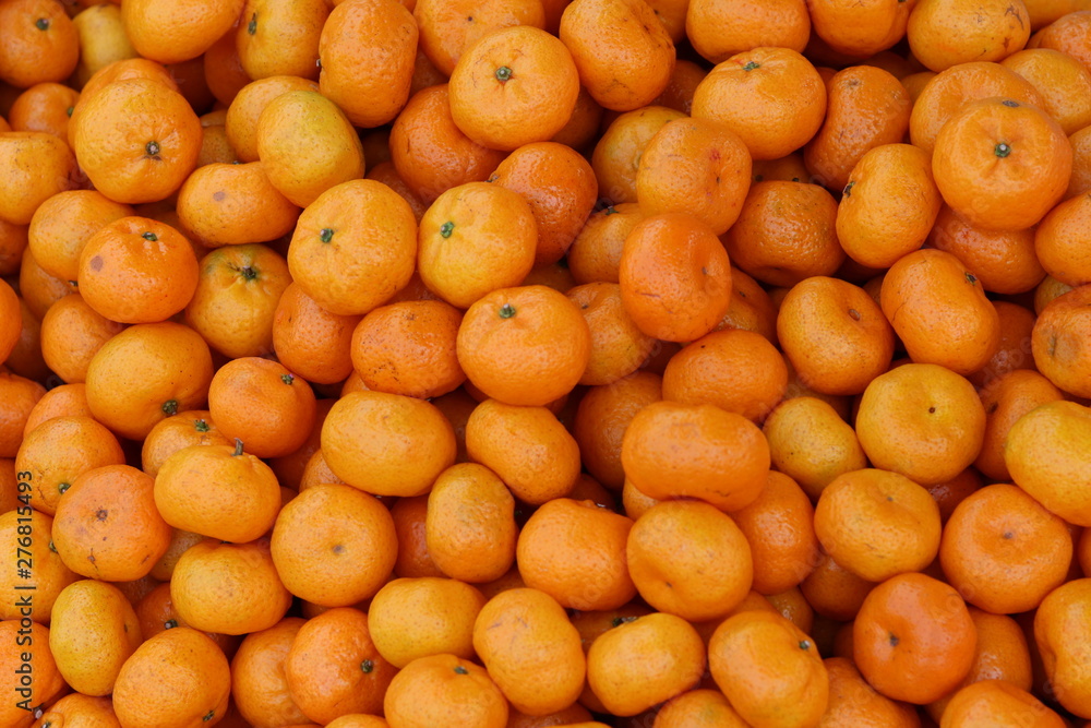 Fresh mandarin oranges texture and background. Fresh mandarin oranges texture and background.