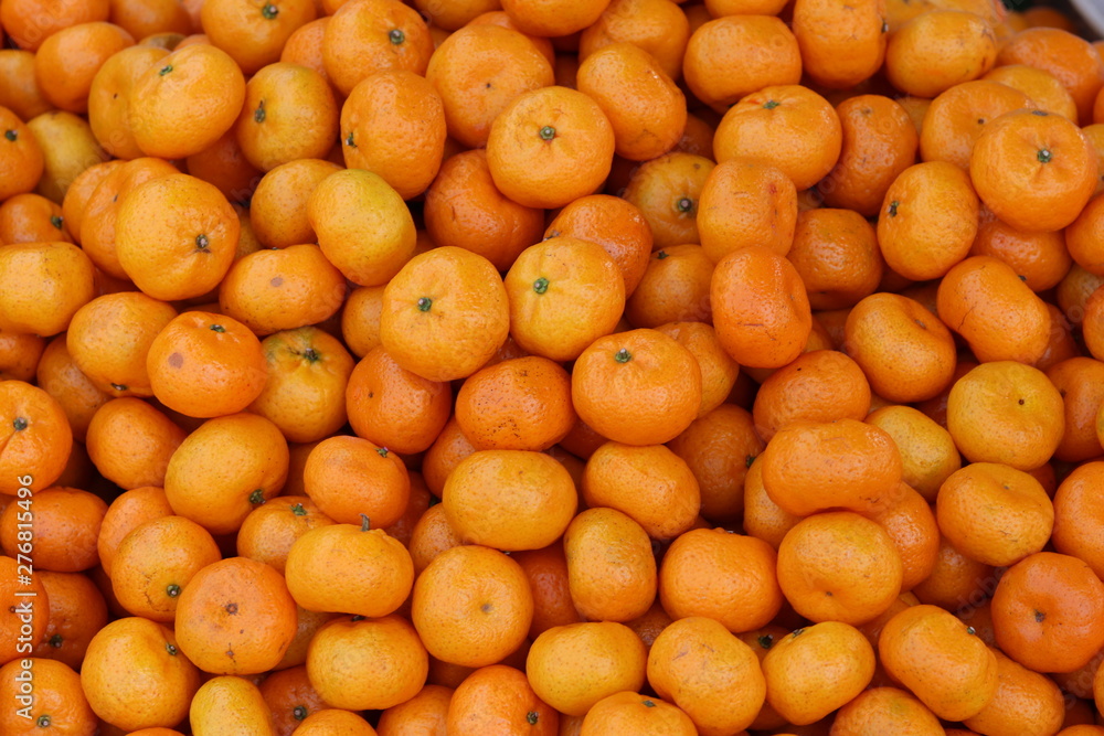 Fresh mandarin oranges texture and background. Fresh mandarin oranges texture and background.