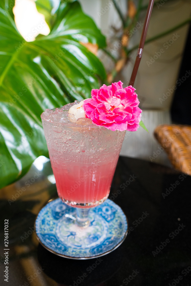 Lychee fruit refreshment in high Glass with straw tube with ice and topping decoration for customer, Fresh smoothies Juice natural to make diet good health for Lunch table bar window seat Lychee fruit refreshment in high Glass with straw tube with ice and topping decoration for customer, Fresh smoothies Juice natural to make diet good health for Lunch table bar window seat