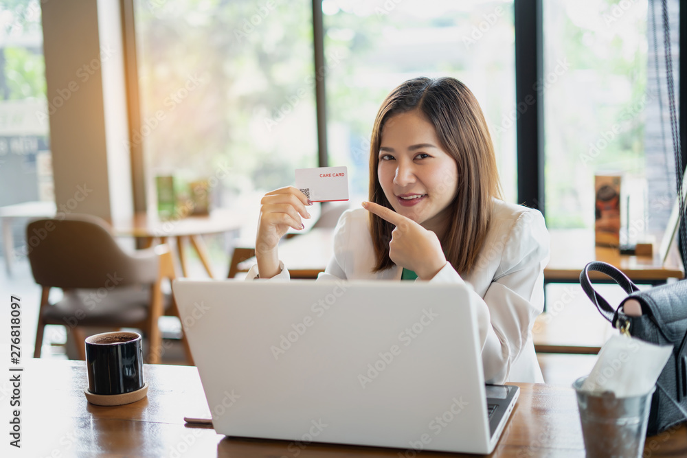 business woman working with use computer and smartphone in coffee shop. business relaxing and break time. freelance working and freedom work. business finance success. business woman working with use computer and smartphone in coffee shop. business relaxing and break time. freelance working and freedom work. business finance success.