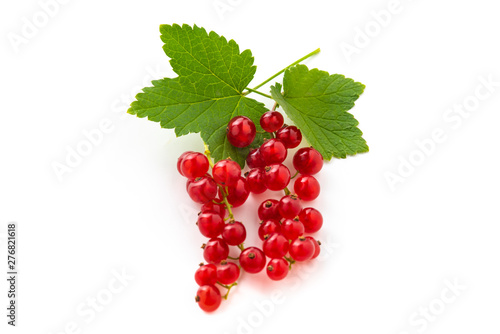 red currant with green leaves isolated on white background