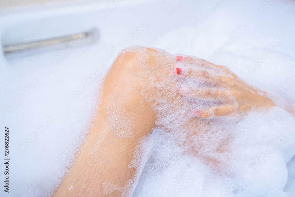 woman shower and relaxing in bathtub woman shower and relaxing in bathtub