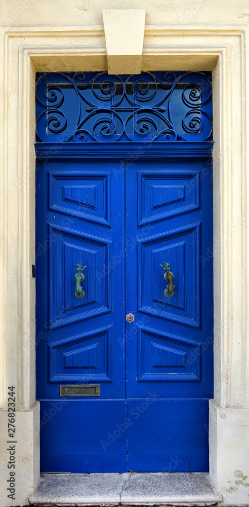 Naklejka premium close up retro style old house door of Mediterranean architectural culture in Mediterranean island Malta