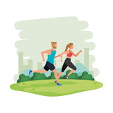 young athletic couple running in the park