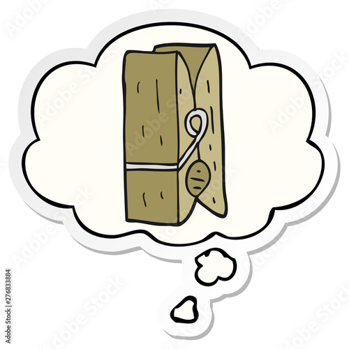 cartoon peg and thought bubble as a printed sticker
