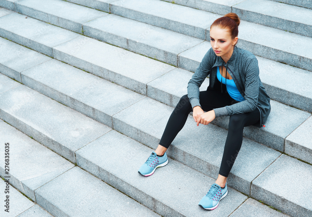 Young, fit and sporty brunette girl in sportswear. Woman doing sports outdoor. Young, fit and sporty brunette girl in sportswear. Woman doing sports outdoor.