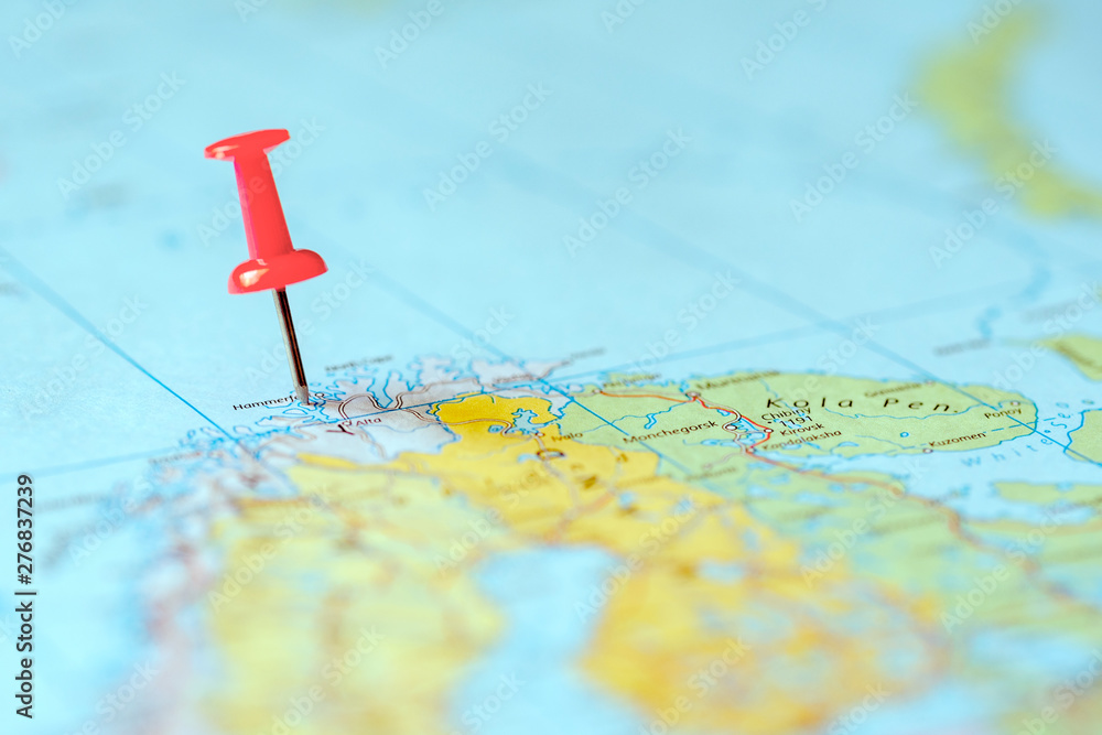 Push pin on the world map Push pin on the world map